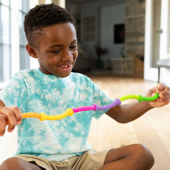 Klocki sensoryczne Plip Links 20 silikonowych półokrągłych elementów Fat Brain Toy