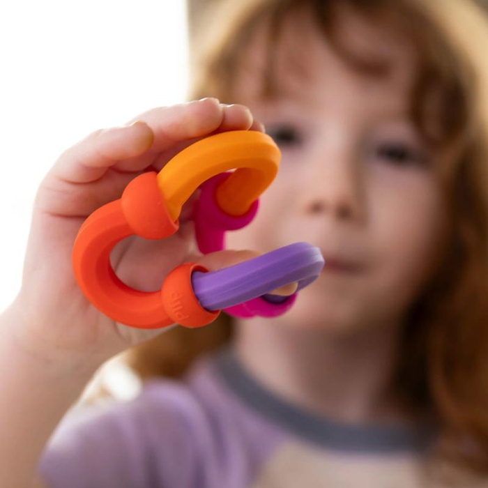 Klocki sensoryczne Plip Links 20 silikonowych półokrągłych elementów Fat Brain Toy
