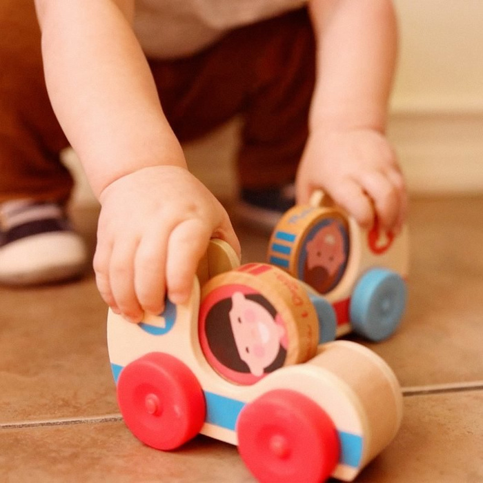 Dwa samochodziki drewniane z krążkami GO Tots Melissa & Doug