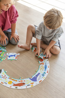 Okrągłe puzzle XXL Odkrywca zwierząt Goula