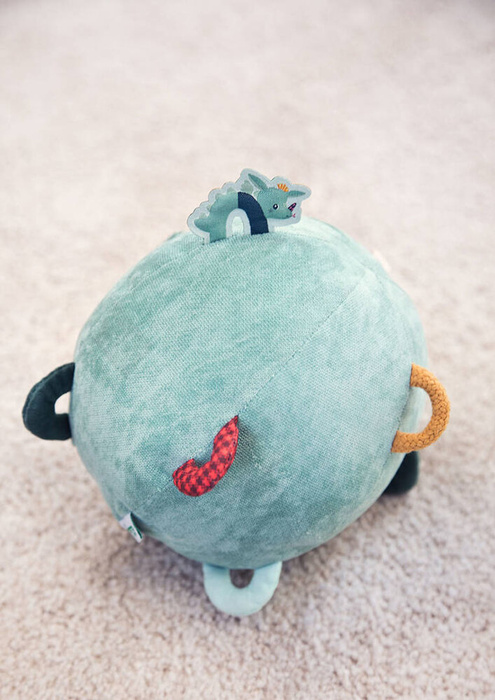 Wielofunkcyjna piłka sensoryczna z pozytywką Smok Joe Lilliputiens